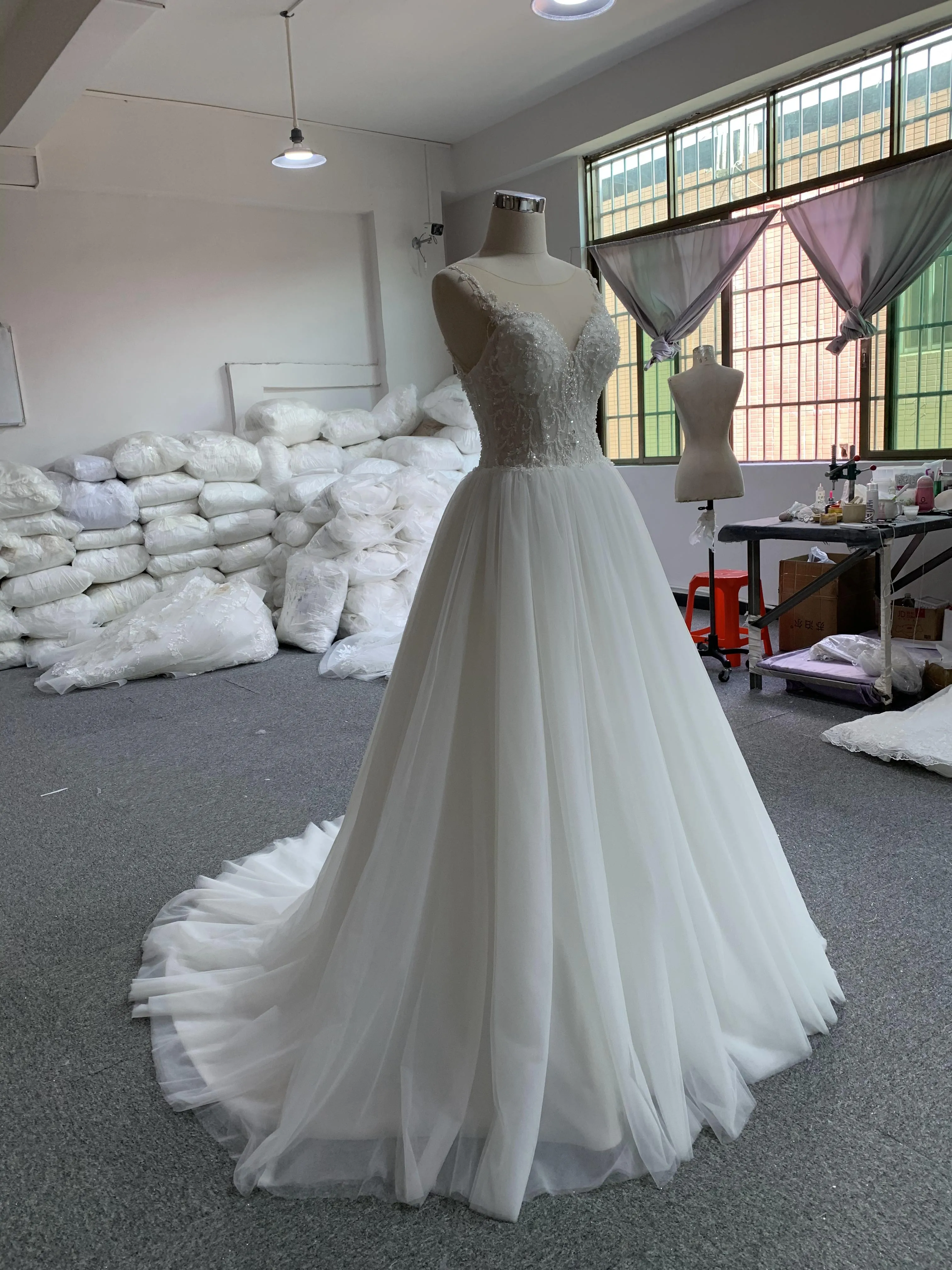 BYG spaghetti strap wedding dress for bride