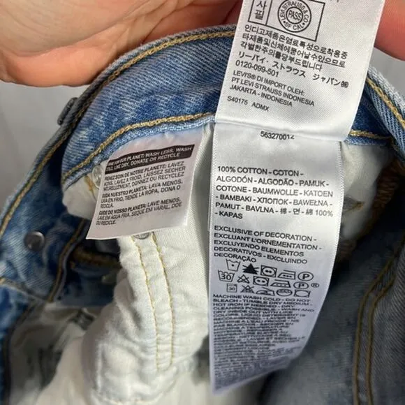 Levi’s x‎ Revolve 501’s High Rise Distressed Denim Shorts.