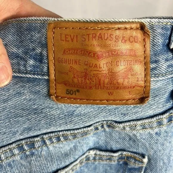 Levi’s x‎ Revolve 501’s High Rise Distressed Denim Shorts.