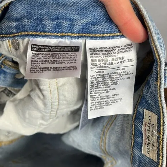 Levi’s x‎ Revolve 501’s High Rise Distressed Denim Shorts.