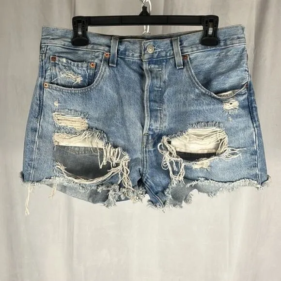 Levi’s x‎ Revolve 501’s High Rise Distressed Denim Shorts.