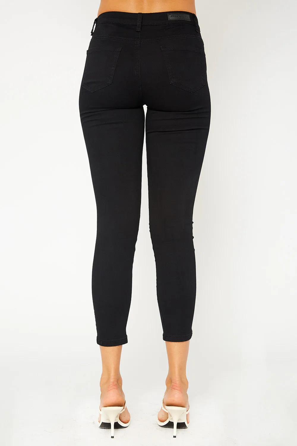 Mid-rise black skinny pants