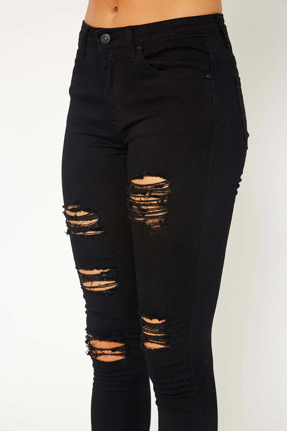 Mid-rise black skinny pants