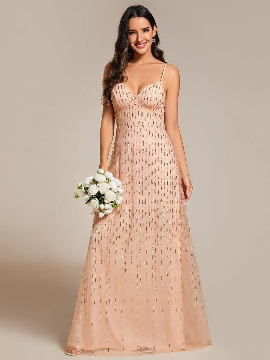 Robe de soirée taille haute à col en V profond et à paillettes ornée de bretelles spaghetti