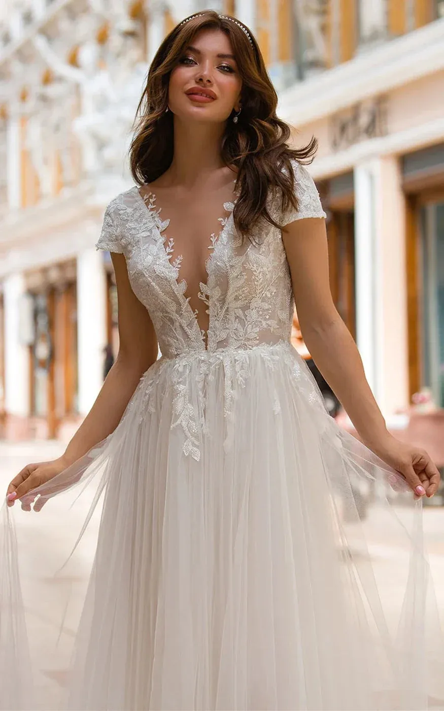 Sexy A Line Plunging Neckline Tulle Sweep Train Wedding Dress with Appliques